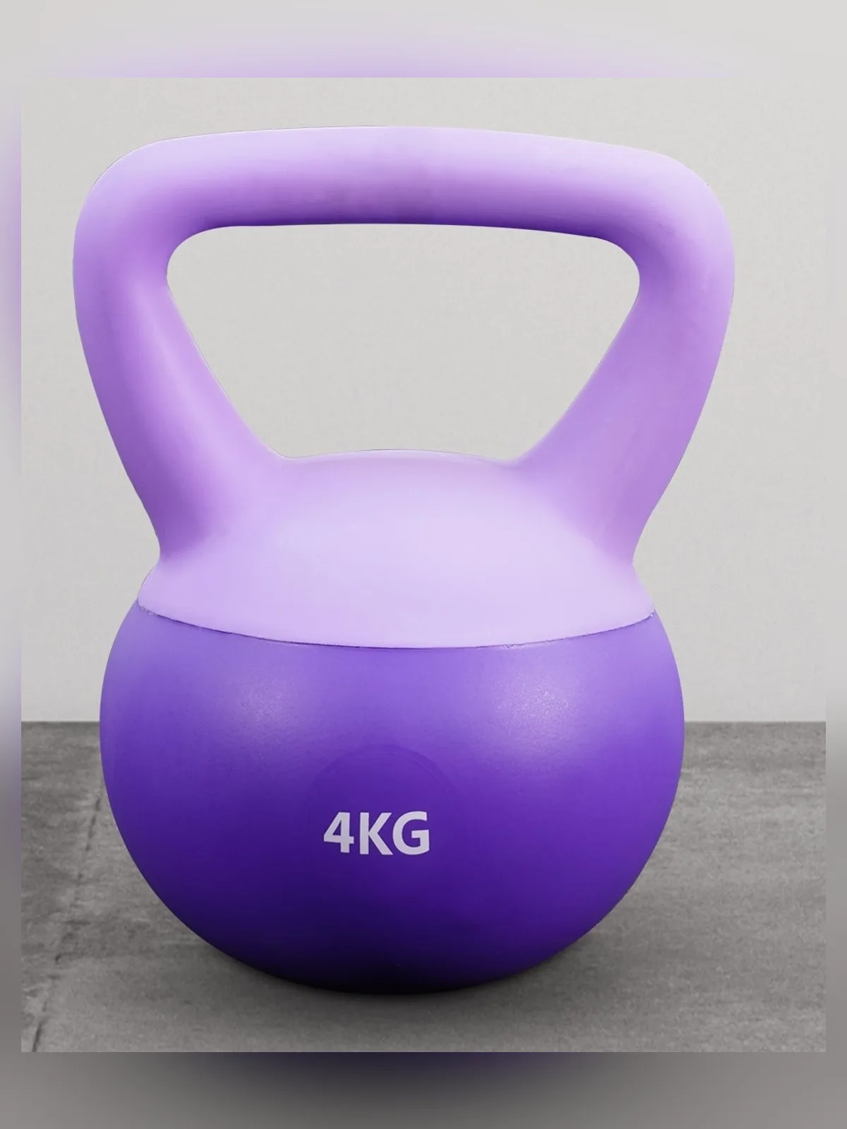 ภาพสินค้าที่อัป เคตเทิลเบลสีม่วงสองโทน มีตัวเลข 4KG วางบนพื้นปูน ไม่มีคนในภาพ